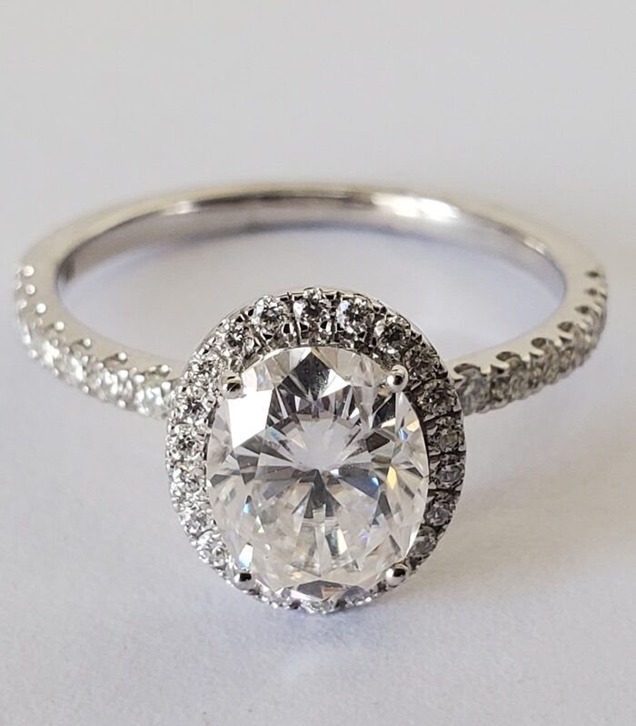 HALO OVAL MOISSANITE ENGAGEMENT RING 18KT WHITE GOLD
