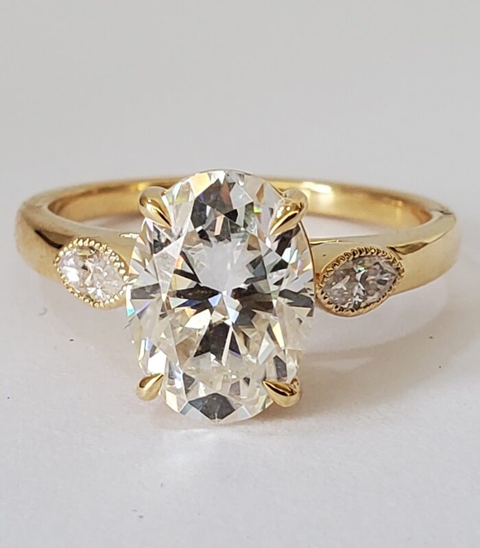 Oval Monae Trilogy Moissanite 18kt yellow gold